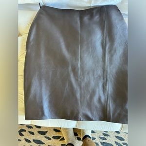 SOLD 


REAL LEATHER BELOW KNEE SKIRT